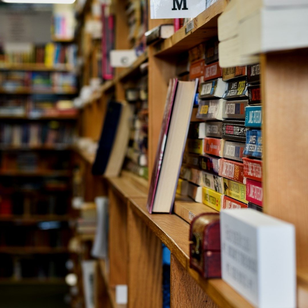 a book shelf filled with lots of books